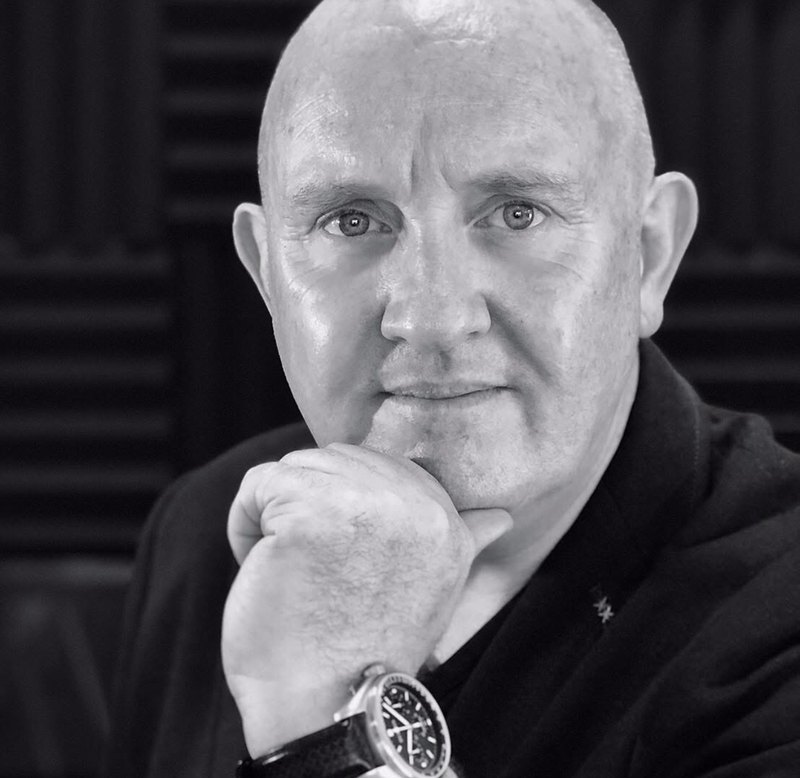 Buzz Langton, founder of One Create, in a black and white portrait
